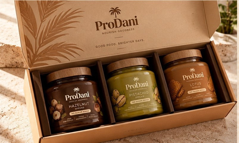 Open ProDani gift box with three spread jars in a fitted insert